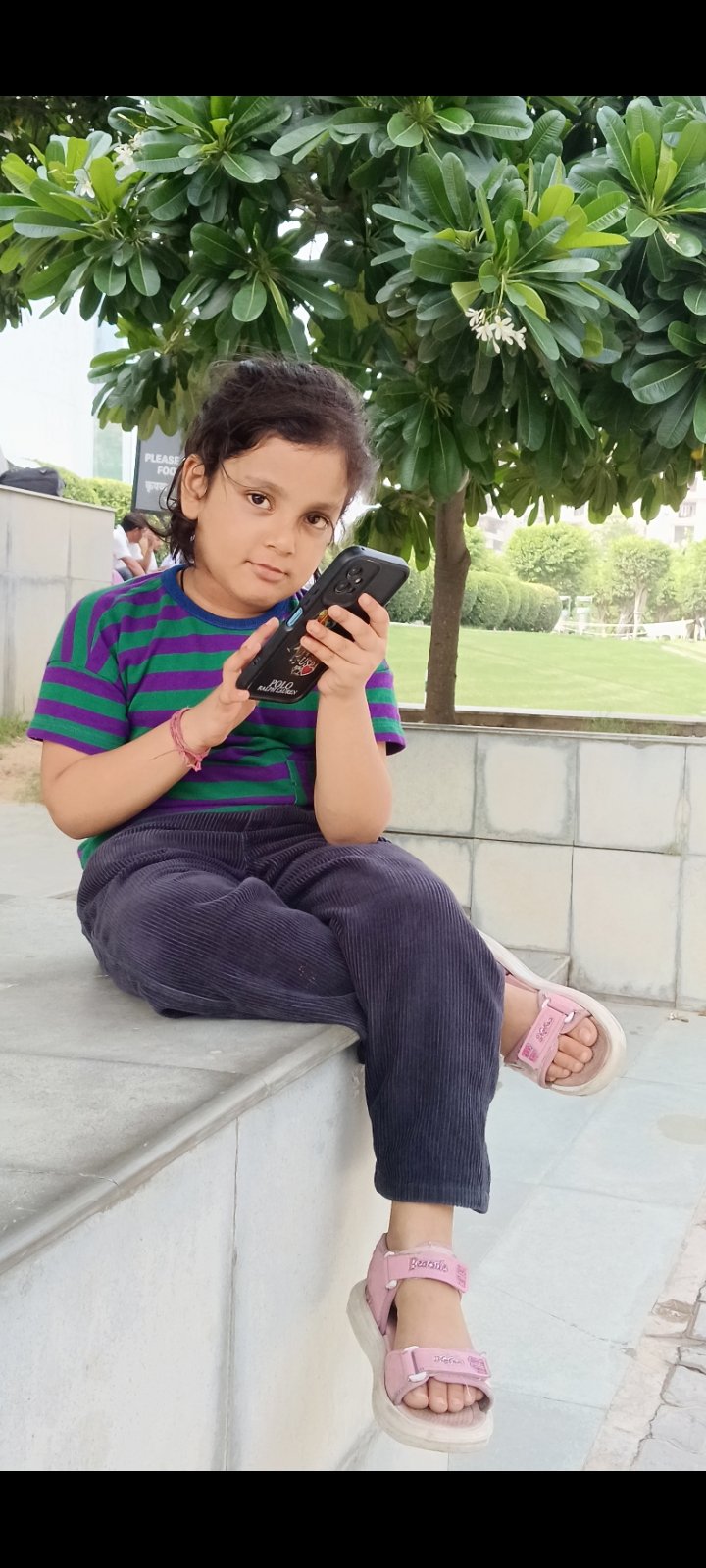 Anahita Playing with Phone